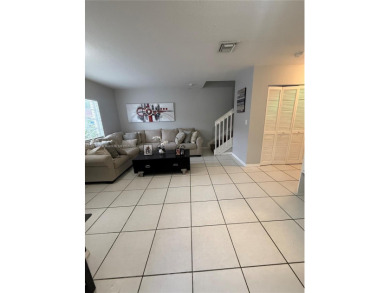 This property is a two-story unit with 3 bed 2.5 bath located in on Country Club of Miami in Florida - for sale on GolfHomes.com, golf home, golf lot