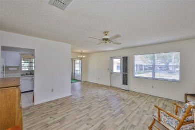 ENJOY LIFE UNDER THE SUN! Whether you're looking for a part-time on Kings Point Executive Golf Course in Florida - for sale on GolfHomes.com, golf home, golf lot