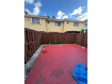 This property is a two-story unit with 3 bed 2.5 bath located in on Country Club of Miami in Florida - for sale on GolfHomes.com, golf home, golf lot