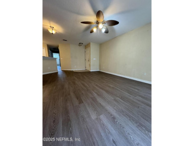 Charming 3BR/2BA End Unit Home in a Prime Location! This on Golf Club At Fleming Island in Florida - for sale on GolfHomes.com, golf home, golf lot