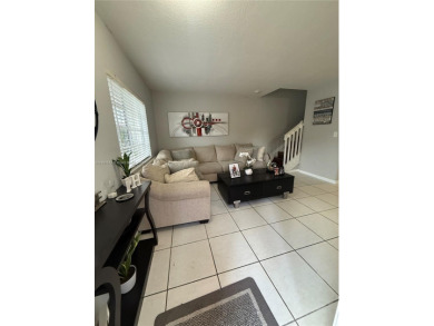 This property is a two-story unit with 3 bed 2.5 bath located in on Country Club of Miami in Florida - for sale on GolfHomes.com, golf home, golf lot