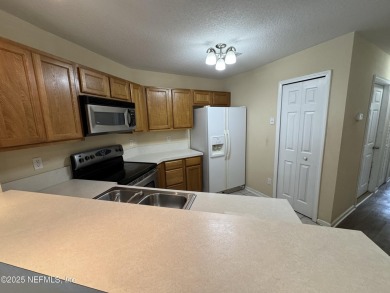 Charming 3BR/2BA End Unit Home in a Prime Location! This on Golf Club At Fleming Island in Florida - for sale on GolfHomes.com, golf home, golf lot