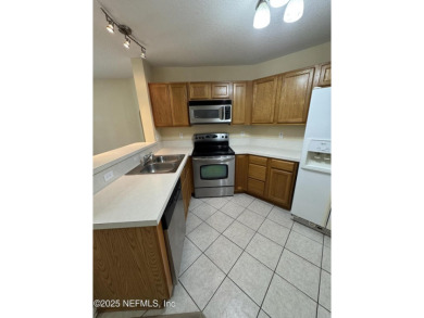Charming 3BR/2BA End Unit Home in a Prime Location! This on Golf Club At Fleming Island in Florida - for sale on GolfHomes.com, golf home, golf lot
