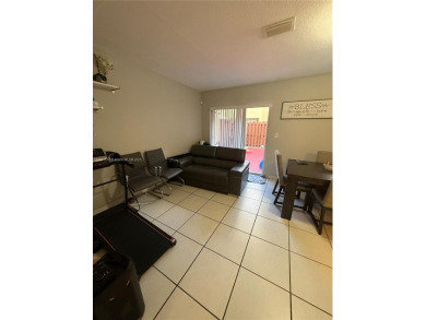 This property is a two-story unit with 3 bed 2.5 bath located in on Country Club of Miami in Florida - for sale on GolfHomes.com, golf home, golf lot