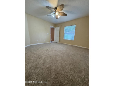 Charming 3BR/2BA End Unit Home in a Prime Location! This on Golf Club At Fleming Island in Florida - for sale on GolfHomes.com, golf home, golf lot