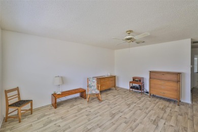 ENJOY LIFE UNDER THE SUN! Whether you're looking for a part-time on Kings Point Executive Golf Course in Florida - for sale on GolfHomes.com, golf home, golf lot