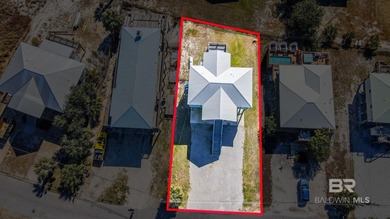 TURN-KEY coastal living with breathtaking water views from every on Isle Dauphine Club Golf Course in Alabama - for sale on GolfHomes.com, golf home, golf lot