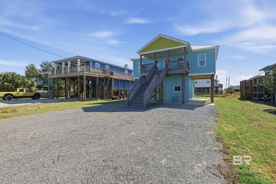TURN-KEY coastal living with breathtaking water views from every on Isle Dauphine Club Golf Course in Alabama - for sale on GolfHomes.com, golf home, golf lot