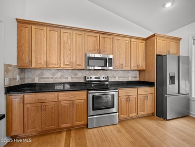 Welcome home and discover the perfect blend of comfort and on North Shore Country Club in North Carolina - for sale on GolfHomes.com, golf home, golf lot