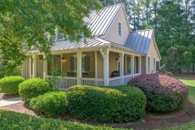 Enjoy beautiful golf course views from the expansive back porch on Reynolds Lake Oconee - The Landing in Georgia - for sale on GolfHomes.com, golf home, golf lot