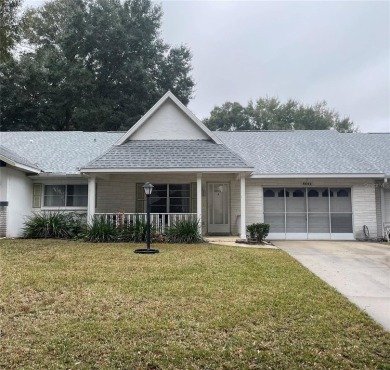 This is a Philadelpian Model home located in Friendship Village on On Top of the World Golf Course in Florida - for sale on GolfHomes.com, golf home, golf lot