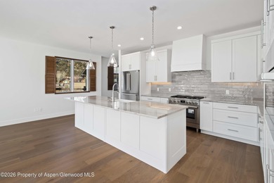 Enjoy this BRAND-NEW CONSTRUCTION Duplex with Stunning Mt on River Valley Ranch Golf Club in Colorado - for sale on GolfHomes.com, golf home, golf lot