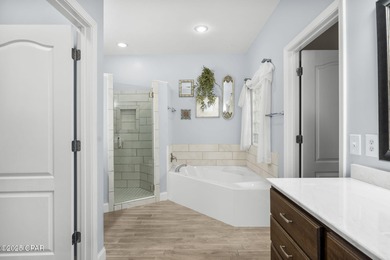 Welcome to 3262 Country Club Drive, a traditional all-brick home on Panama Country Club in Florida - for sale on GolfHomes.com, golf home, golf lot