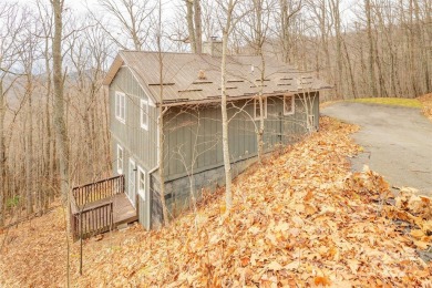 A charming cottage in beautiful Wolf Laurel with privacy and on Wolf Laurel Country Club in North Carolina - for sale on GolfHomes.com, golf home, golf lot