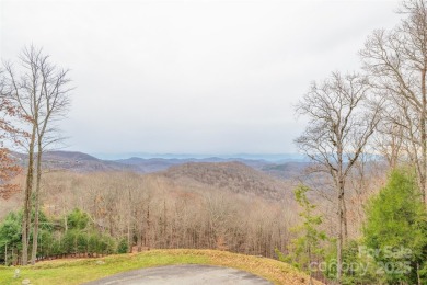 A charming cottage in beautiful Wolf Laurel with privacy and on Wolf Laurel Country Club in North Carolina - for sale on GolfHomes.com, golf home, golf lot