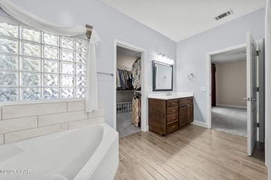 Welcome to 3262 Country Club Drive, a traditional all-brick home on Panama Country Club in Florida - for sale on GolfHomes.com, golf home, golf lot