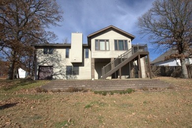 Golf Lover's dream! This spacious 3-sided brick home has plenty on Briarbrook Golf Course in Missouri - for sale on GolfHomes.com, golf home, golf lot