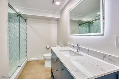 This fully reimagined and luxuriously updated 3-bedroom, 2-bath on The Dunes Golf and Tennis Club in Florida - for sale on GolfHomes.com, golf home, golf lot