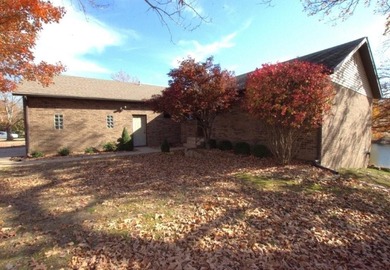Golf Lover's dream! This spacious 3-sided brick home has plenty on Briarbrook Golf Course in Missouri - for sale on GolfHomes.com, golf home, golf lot