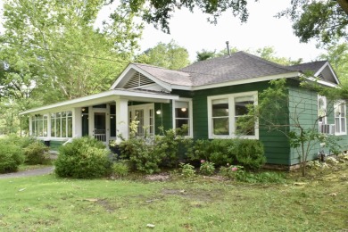 This delightful 3-bedroom, 2-bathroom Craftsman bungalow is on Helena Country Club in Arkansas - for sale on GolfHomes.com, golf home, golf lot