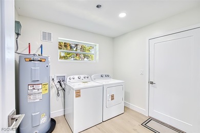 This fully reimagined and luxuriously updated 3-bedroom, 2-bath on The Dunes Golf and Tennis Club in Florida - for sale on GolfHomes.com, golf home, golf lot