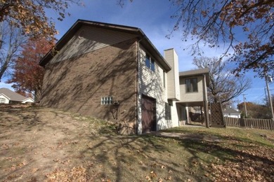 Golf Lover's dream! This spacious 3-sided brick home has plenty on Briarbrook Golf Course in Missouri - for sale on GolfHomes.com, golf home, golf lot