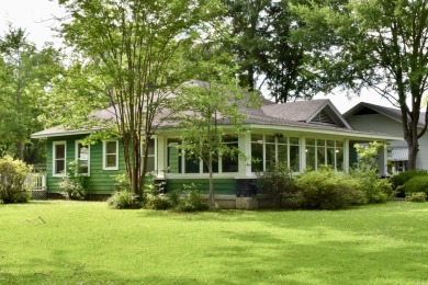 This delightful 3-bedroom, 2-bathroom Craftsman bungalow is on Helena Country Club in Arkansas - for sale on GolfHomes.com, golf home, golf lot