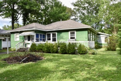 This delightful 3-bedroom, 2-bathroom Craftsman bungalow is on Helena Country Club in Arkansas - for sale on GolfHomes.com, golf home, golf lot