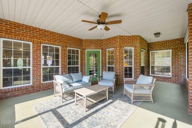 Welcome to 3262 Country Club Drive, a traditional all-brick home on Panama Country Club in Florida - for sale on GolfHomes.com, golf home, golf lot