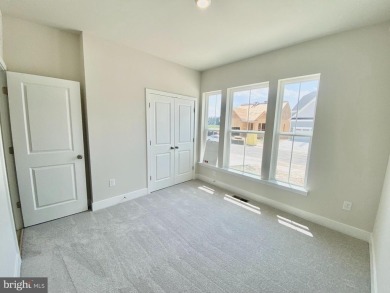 MOVE IN READY-FINISHED BASEMENT AND UPPER LEVEL!  Photos are of on Plantation Lakes Golf and Country Club in Delaware - for sale on GolfHomes.com, golf home, golf lot