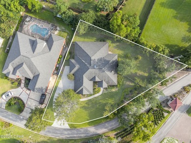 Welcome to 3262 Country Club Drive, a traditional all-brick home on Panama Country Club in Florida - for sale on GolfHomes.com, golf home, golf lot