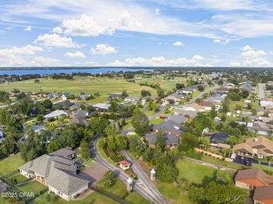 Welcome to 3262 Country Club Drive, a traditional all-brick home on Panama Country Club in Florida - for sale on GolfHomes.com, golf home, golf lot
