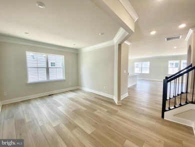 MOVE IN READY-FINISHED BASEMENT AND UPPER LEVEL!  Photos are of on Plantation Lakes Golf and Country Club in Delaware - for sale on GolfHomes.com, golf home, golf lot