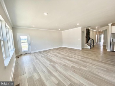 MOVE IN READY-FINISHED BASEMENT AND UPPER LEVEL!  Photos are of on Plantation Lakes Golf and Country Club in Delaware - for sale on GolfHomes.com, golf home, golf lot