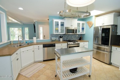 Beautifully located home is just a short golf cart ride from all on Ocean Point Golf Links in South Carolina - for sale on GolfHomes.com, golf home, golf lot