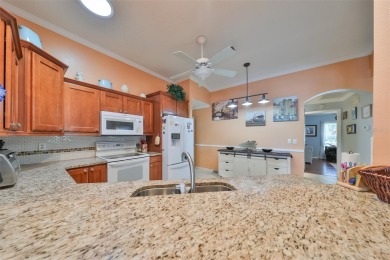 Don't miss this stunning, well-maintained home in Kings Point on Falcon Watch Golf Club in Florida - for sale on GolfHomes.com, golf home, golf lot