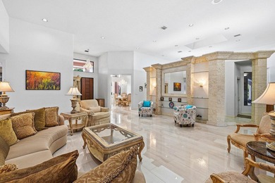 Welcome home to this sprawling executive estate in the exclusive on Bocaire Country Club in Florida - for sale on GolfHomes.com, golf home, golf lot