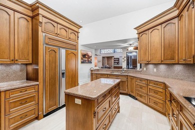 Welcome home to this sprawling executive estate in the exclusive on Bocaire Country Club in Florida - for sale on GolfHomes.com, golf home, golf lot