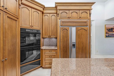 Welcome home to this sprawling executive estate in the exclusive on Bocaire Country Club in Florida - for sale on GolfHomes.com, golf home, golf lot