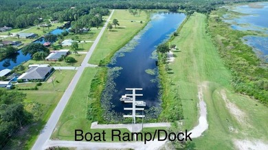 Country living at its finest on this half acre lot in this gated on Indian Lake Estates Golf and Country Club in Florida - for sale on GolfHomes.com, golf home, golf lot