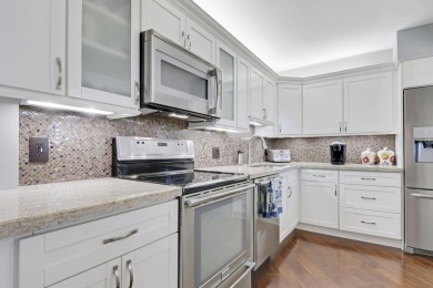 Experience coastal living at its finest in this beautiful  2 bed on Jupiter Dunes Golf Course in Florida - for sale on GolfHomes.com, golf home, golf lot
