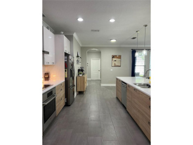 This 4 bedroom, 2.5 bath is a MUST SEE with all things NEW! All on Harmony Golf Preserve in Florida - for sale on GolfHomes.com, golf home, golf lot