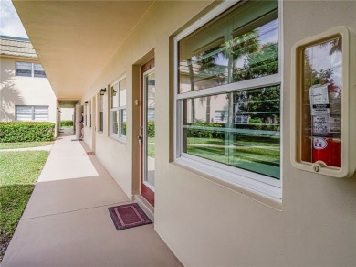 First Floor! Beautiful plank laminate floors w/ newer baseboard on Vero Beach South Golf Course in Florida - for sale on GolfHomes.com, golf home, golf lot