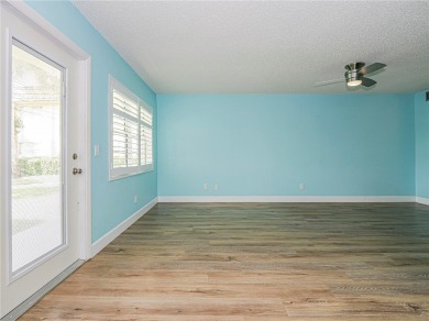 First Floor! Beautiful plank laminate floors w/ newer baseboard on Vero Beach South Golf Course in Florida - for sale on GolfHomes.com, golf home, golf lot