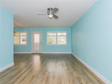 First Floor! Beautiful plank laminate floors w/ newer baseboard on Vero Beach South Golf Course in Florida - for sale on GolfHomes.com, golf home, golf lot