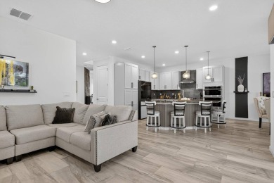 325 Shore Crab Way | 4 Bedrooms | 4 Bathrooms | 2,532 Sq Ft | on Apollo Beach Golf and Sea Club in Florida - for sale on GolfHomes.com, golf home, golf lot