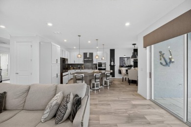 325 Shore Crab Way | 4 Bedrooms | 4 Bathrooms | 2,532 Sq Ft | on Apollo Beach Golf and Sea Club in Florida - for sale on GolfHomes.com, golf home, golf lot