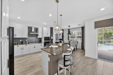 325 Shore Crab Way | 4 Bedrooms | 4 Bathrooms | 2,532 Sq Ft | on Apollo Beach Golf and Sea Club in Florida - for sale on GolfHomes.com, golf home, golf lot