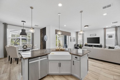 325 Shore Crab Way | 4 Bedrooms | 4 Bathrooms | 2,532 Sq Ft | on Apollo Beach Golf and Sea Club in Florida - for sale on GolfHomes.com, golf home, golf lot