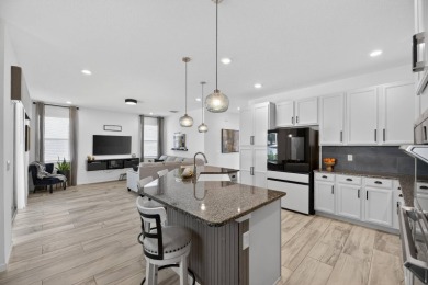 325 Shore Crab Way | 4 Bedrooms | 4 Bathrooms | 2,532 Sq Ft | on Apollo Beach Golf and Sea Club in Florida - for sale on GolfHomes.com, golf home, golf lot